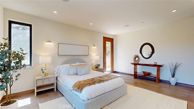 12480 Viewcrest Rd, Studio City, CA 91604 - bedroom with wood finished floors and recessed lighting
