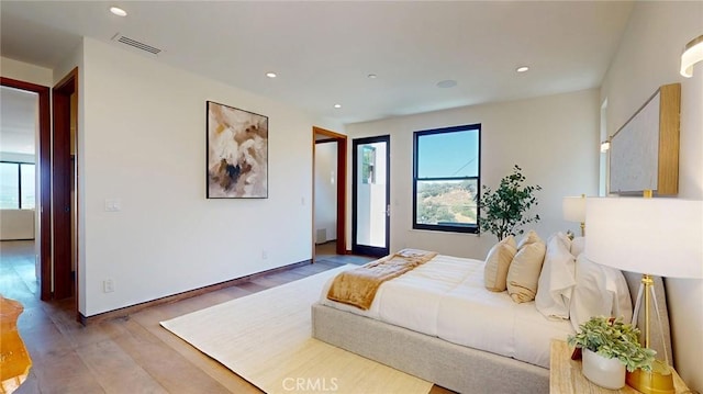12480 Viewcrest Rd, Studio City, CA 91604 - bedroom featuring light wood-style flooring, recessed lighting, and access to exterior