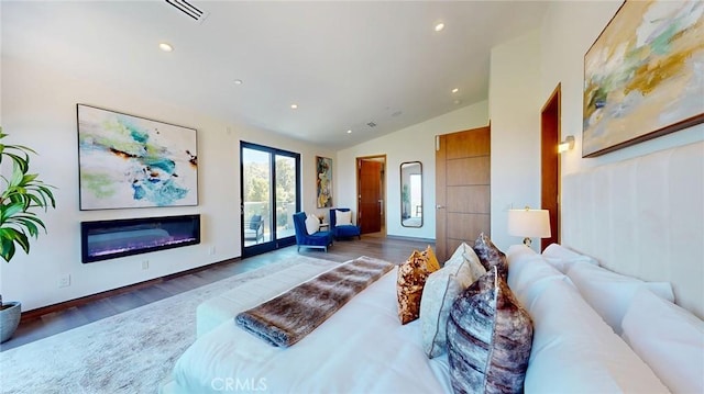 12480 Viewcrest Rd, Studio City, CA 91604 - bedroom featuring access to outside, lofted ceiling, wood finished floors, recessed lighting, and a glass covered fireplace