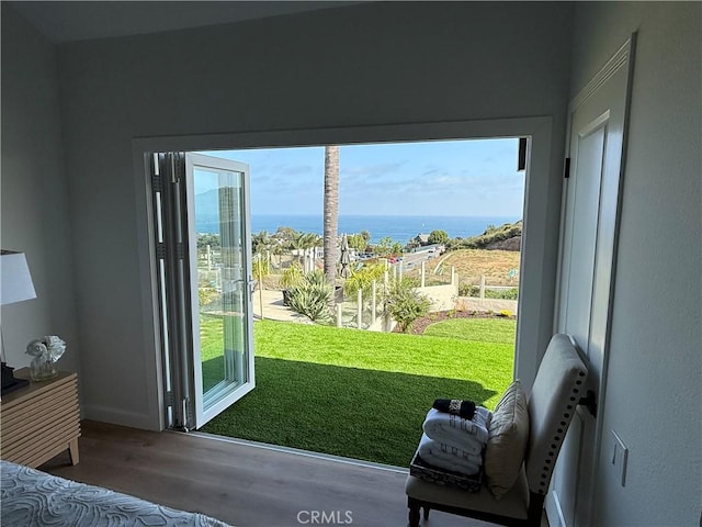 83 Palm Beach Ct, Dana Point, CA 92629 - doorway to outside featuring wood finished floors and a water view