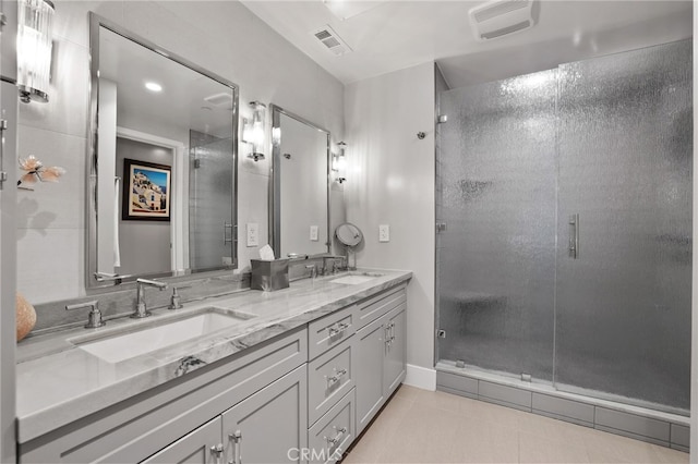 1920 S Pacific Coast Hwy, Redondo Beach, CA 90277 - full bathroom with double vanity, a shower stall, and tile patterned floors