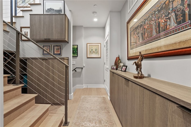 1920 S Pacific Coast Hwy, Redondo Beach, CA 90277 - staircase featuring wood finished floors and recessed lighting