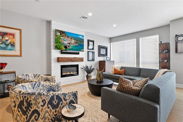 1920 S Pacific Coast Hwy, Redondo Beach, CA 90277 - living room with a fireplace, recessed lighting, and wood finished floors