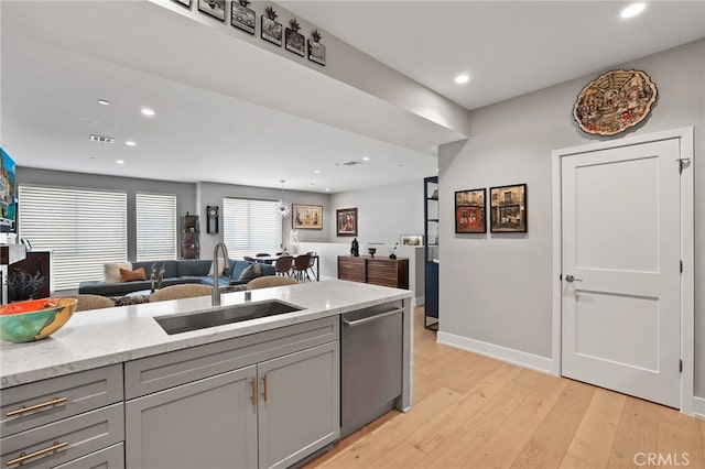1920 S Pacific Coast Hwy, Redondo Beach, CA 90277 - kitchen featuring gray cabinets, stainless steel dishwasher, open floor plan, light wood-style floors, and recessed lighting