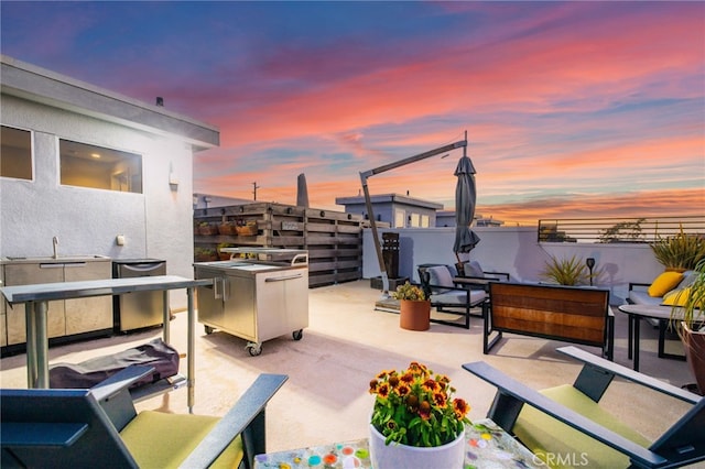 1920 S Pacific Coast Hwy, Redondo Beach, CA 90277 - patio terrace at dusk featuring a patio and outdoor lounge area