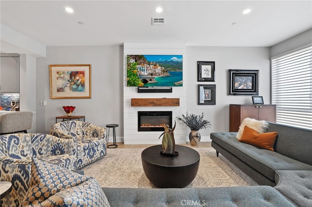 1920 S Pacific Coast Hwy, Redondo Beach, CA 90277 - living area with a large fireplace, recessed lighting, and wood finished floors