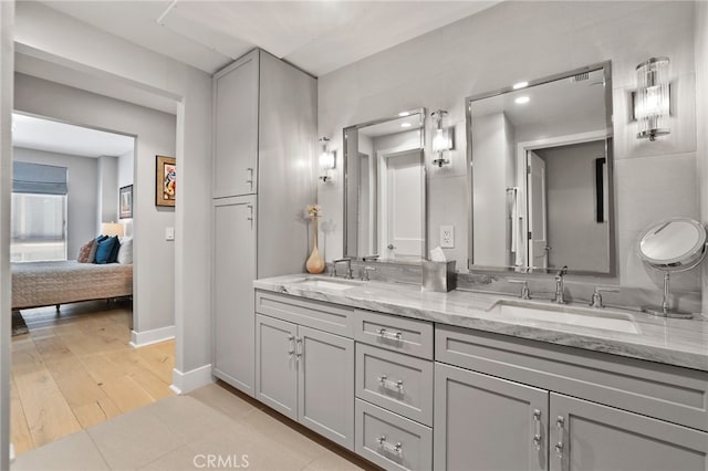 1920 S Pacific Coast Hwy, Redondo Beach, CA 90277 - full bath with double vanity, connected bathroom, wood finished floors, and recessed lighting