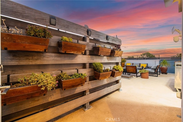 1920 S Pacific Coast Hwy, Redondo Beach, CA 90277 - patio terrace at dusk featuring an outdoor living space and a patio area
