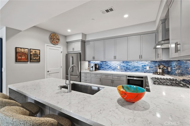 1920 S Pacific Coast Hwy, Redondo Beach, CA 90277 - kitchen with gray cabinets, stainless steel appliances, light stone countertops, and recessed lighting