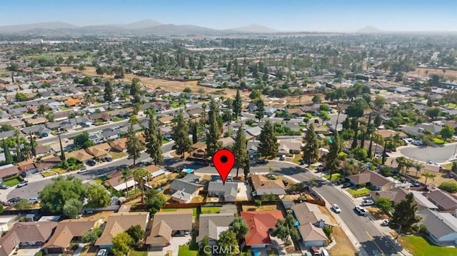 4440 Daniel Dr, Riverside, CA 92503 - aerial view of property's location with mountains and nearby suburban area