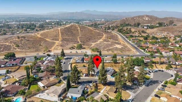 4440 Daniel Dr, Riverside, CA 92503 - aerial view of property and surrounding area with nearby suburban area