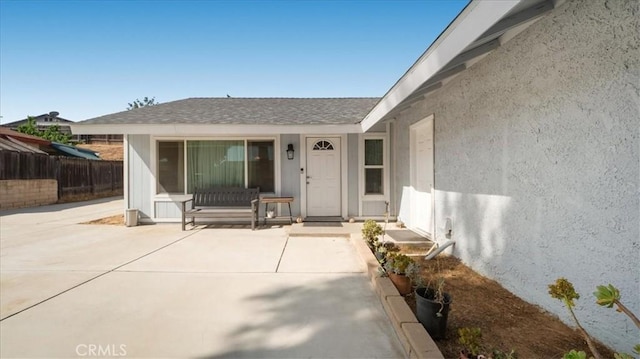 4440 Daniel Dr, Riverside, CA 92503 - view of exterior entry featuring stucco siding and a patio