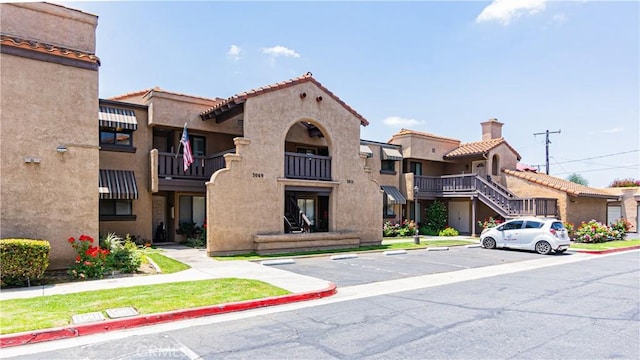 3069 Brea Blvd Unit 10, Fullerton, CA 92835 - view of building exterior featuring uncovered parking