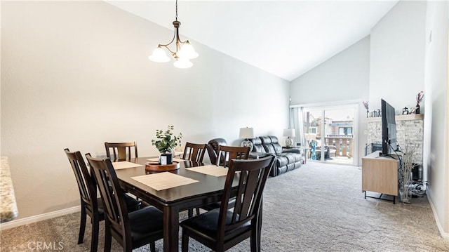 3069 Brea Blvd Unit 10, Fullerton, CA 92835 - dining space featuring carpet floors, high vaulted ceiling, and a chandelier