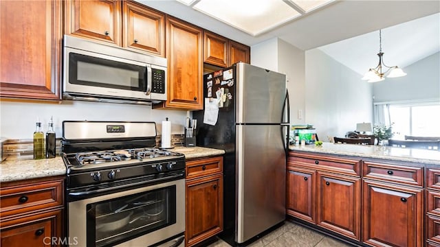 3069 Brea Blvd Unit 10, Fullerton, CA 92835 - kitchen with stainless steel appliances, pendant lighting, light tile patterned floors, light stone countertops, and lofted ceiling