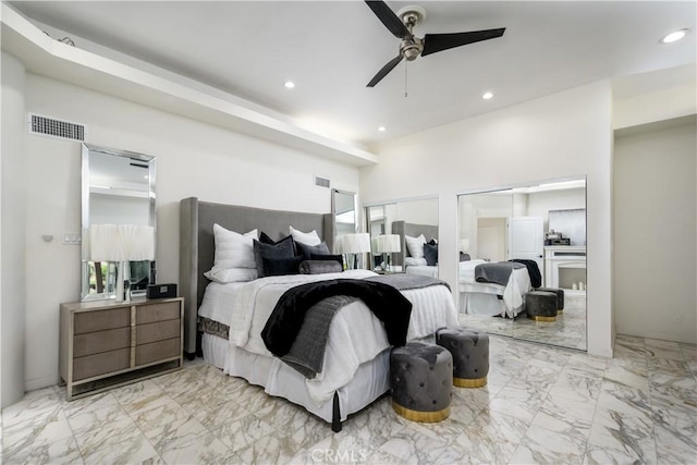 4557 Don Timoteo Dr, Los Angeles, CA 90008 - bedroom with light marble finish floors, recessed lighting, multiple closets, and a ceiling fan