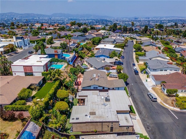 4557 Don Timoteo Dr, Los Angeles, CA 90008 - aerial perspective of suburban area with a pool area