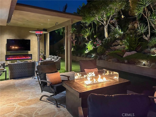 4557 Don Timoteo Dr, Los Angeles, CA 90008 - view of patio / terrace featuring an outdoor living space with a fire pit