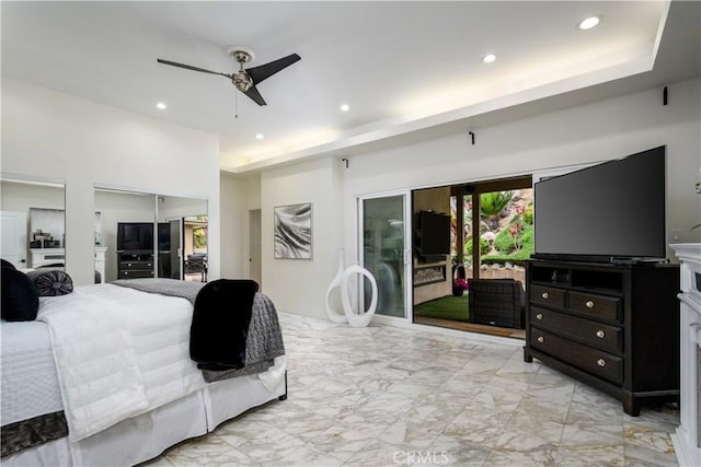 4557 Don Timoteo Dr, Los Angeles, CA 90008 - bedroom featuring light marble finish floors, recessed lighting, multiple closets, and a ceiling fan