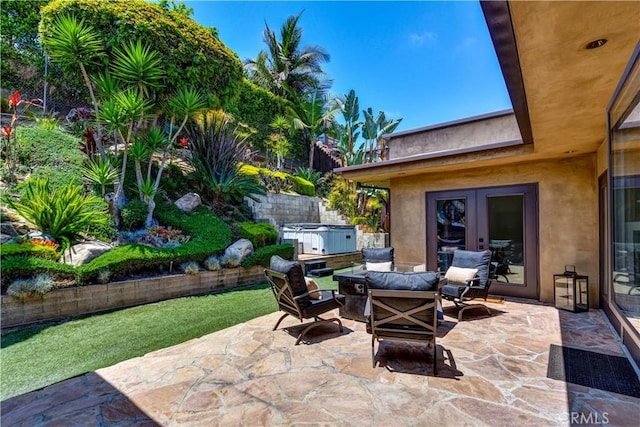 4557 Don Timoteo Dr, Los Angeles, CA 90008 - view of patio / terrace featuring a hot tub and french doors
