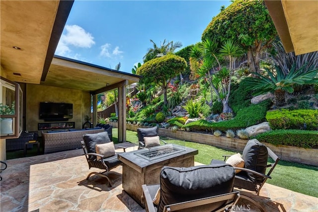 4557 Don Timoteo Dr, Los Angeles, CA 90008 - view of patio / terrace with an outdoor living space with a fire pit