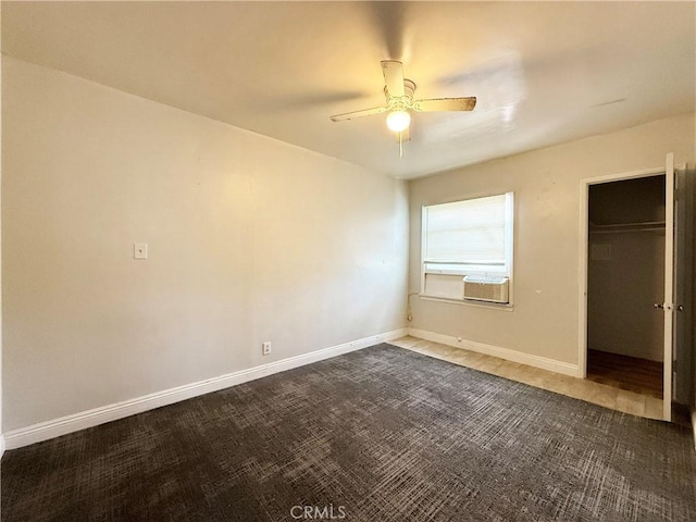 3864 Myers St, Riverside, CA 92503 - unfurnished bedroom with dark carpet, cooling unit, a closet, and a ceiling fan