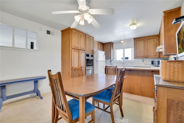 9452 El Valle Ave, Fountain Valley, CA 92708 - dining area with ceiling fan