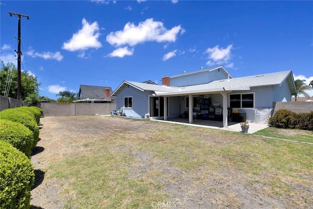 9452 El Valle Ave, Fountain Valley, CA 92708 - rear view of property with a fenced backyard, a patio, and stucco siding
