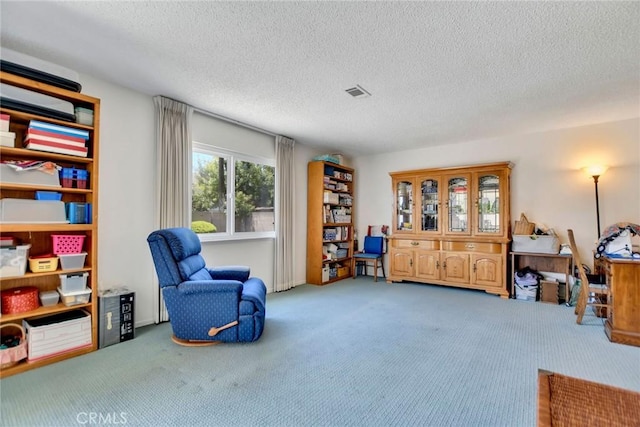 9452 El Valle Ave, Fountain Valley, CA 92708 - sitting room featuring carpet floors and a textured ceiling