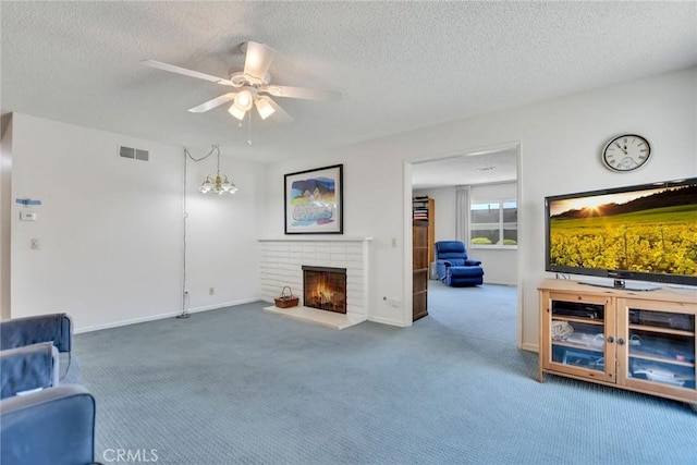 9452 El Valle Ave, Fountain Valley, CA 92708 - living area featuring carpet floors, a textured ceiling, ceiling fan, and a brick fireplace