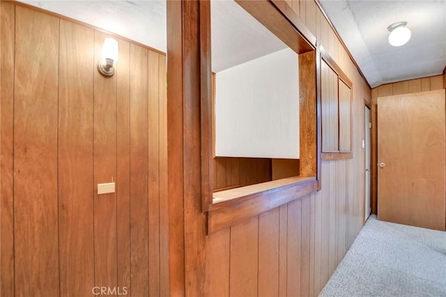 9452 El Valle Ave, Fountain Valley, CA 92708 - hallway featuring wood walls and carpet floors