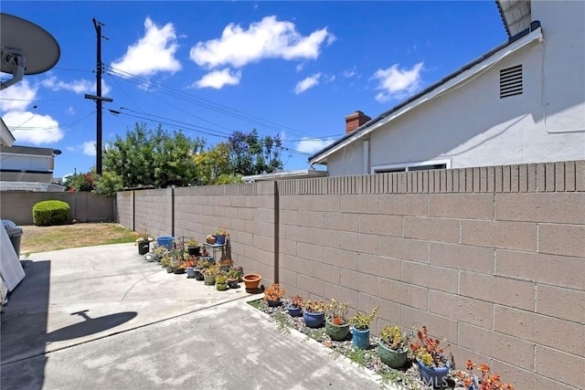 9452 El Valle Ave, Fountain Valley, CA 92708 - fenced backyard with a patio area