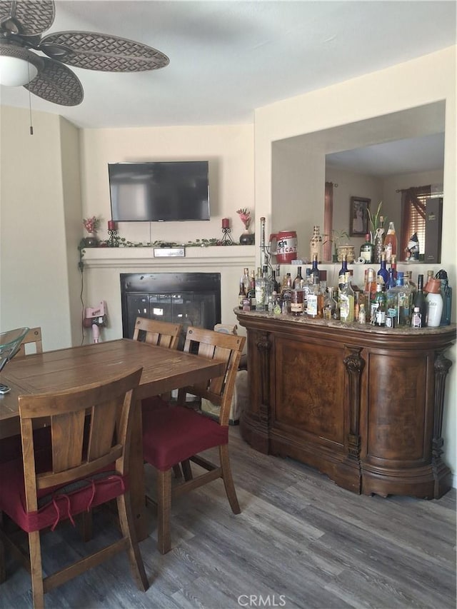 13772 Helena Ave, Victorville, CA 92392 - indoor dry bar with a ceiling fan, wood finished floors, and a fireplace