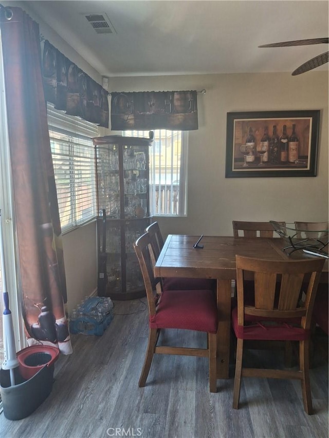 13772 Helena Ave, Victorville, CA 92392 - dining space with wood finished floors, plenty of natural light, and a ceiling fan