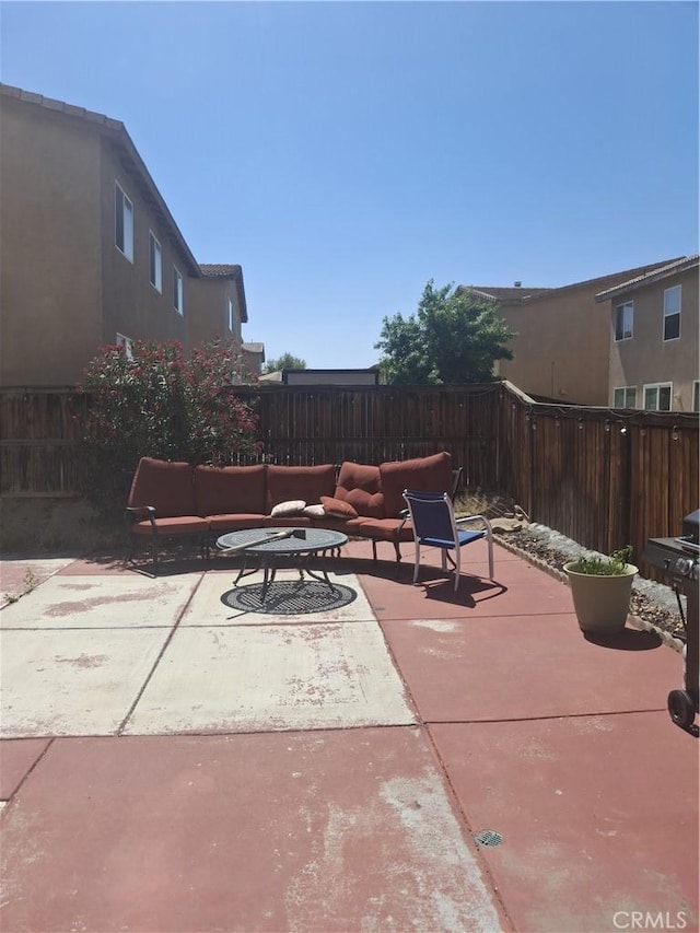 13772 Helena Ave, Victorville, CA 92392 - fenced backyard featuring a patio area and an outdoor living space