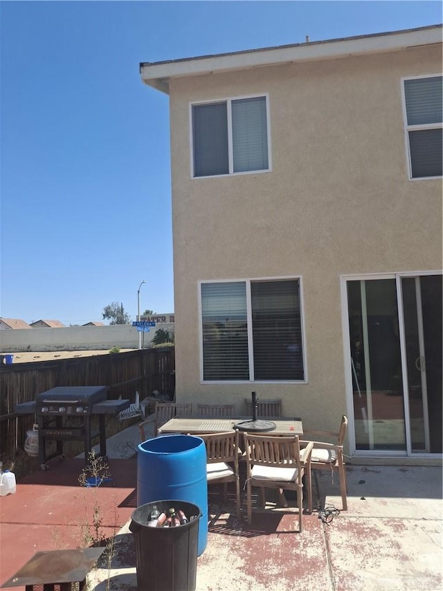 13772 Helena Ave, Victorville, CA 92392 - back of house featuring a patio area and stucco siding