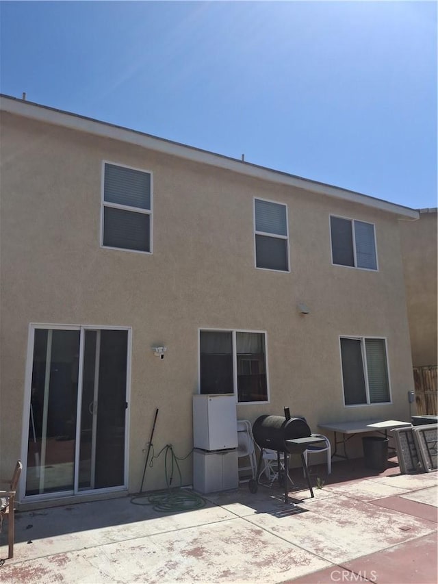 13772 Helena Ave, Victorville, CA 92392 - rear view of property featuring a patio area and stucco siding