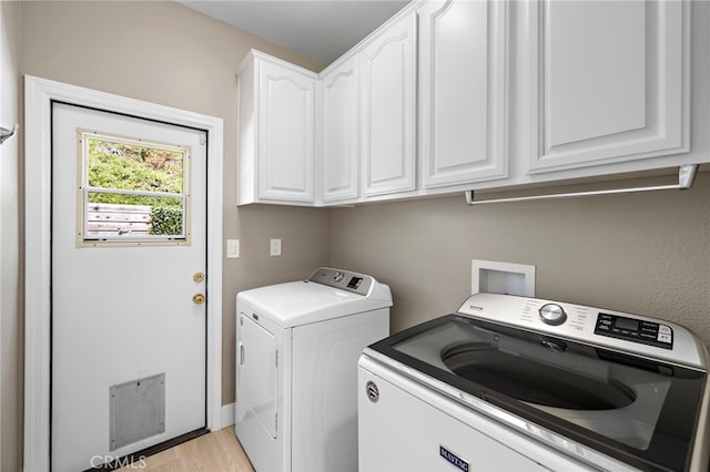 9 Cranwell, Aliso Viejo, CA 92656 - laundry room featuring cabinet space, independent washer and dryer, and light wood-style floors