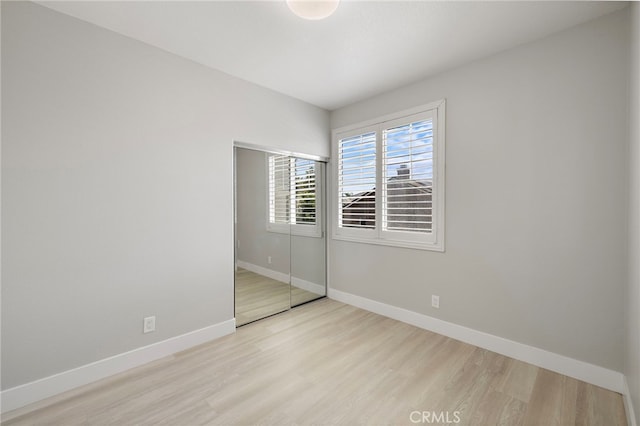 9 Cranwell, Aliso Viejo, CA 92656 - unfurnished bedroom with wood finished floors and a closet