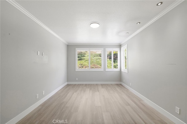 9 Cranwell, Aliso Viejo, CA 92656 - unfurnished room featuring light wood-style flooring and crown molding