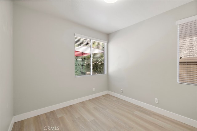 9 Cranwell, Aliso Viejo, CA 92656 - spare room featuring light wood-style floors and baseboards