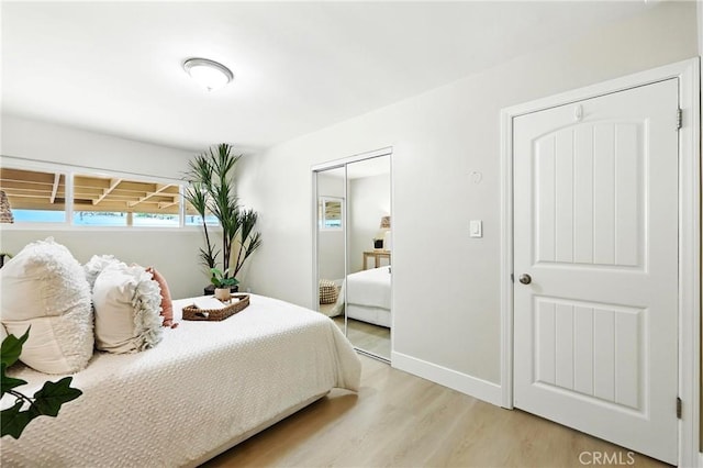 1446 Ravenna Ave, Wilmington, CA 90744 - bedroom with light wood finished floors and a closet