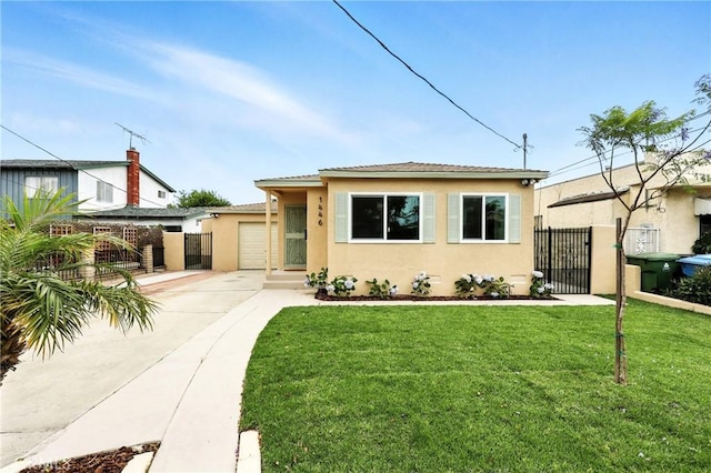 1446 Ravenna Ave, Wilmington, CA 90744 - bungalow-style house with a gate, stucco siding, driveway, and a garage