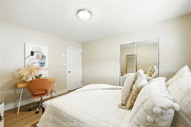 1446 Ravenna Ave, Wilmington, CA 90744 - bedroom featuring wood finished floors and a closet