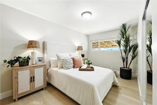 1446 Ravenna Ave, Wilmington, CA 90744 - bedroom featuring light wood-style floors and baseboards