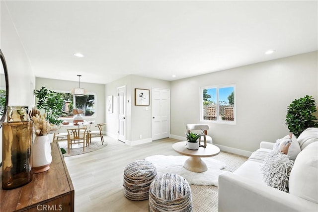 1446 Ravenna Ave, Wilmington, CA 90744 - living area with light wood-type flooring and recessed lighting