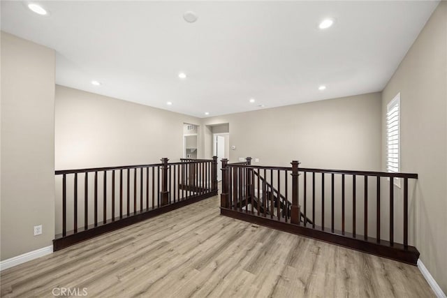 6792 Vanderbilt St, Chino, CA 91710 - spare room with wood finished floors and recessed lighting