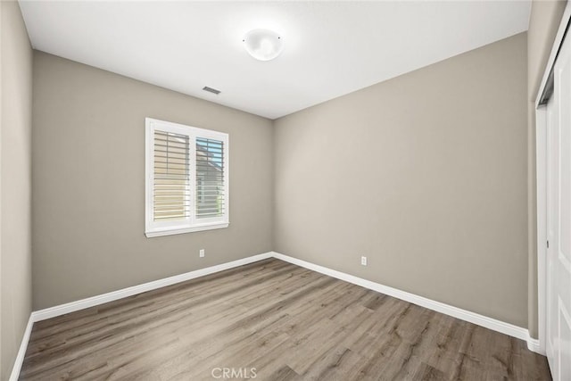 6792 Vanderbilt St, Chino, CA 91710 - empty room featuring wood finished floors and baseboards