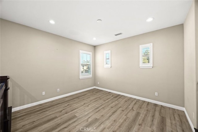 6792 Vanderbilt St, Chino, CA 91710 - unfurnished room with wood finished floors and recessed lighting