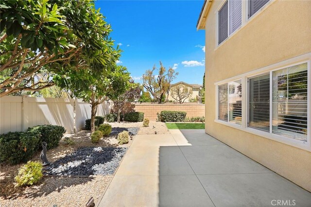 6792 Vanderbilt St, Chino, CA 91710 - fenced backyard with a patio area
